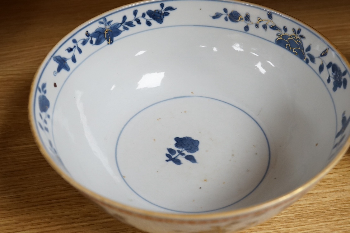 An 18th century Chinese porcelain blue and white bowl with iron red border, 21cm in diameter. Condition - good